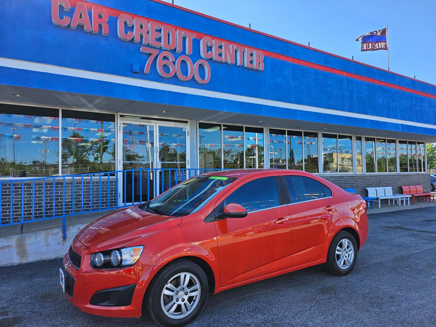 2012 ORANGE Chevrolet Sonic 1LT Sedan (1G1JD5SB8C4) with an 1.4L L4 DOHC 24V TURBO FFV engine, located at 7600 S Western Ave., Chicago, IL, 60620, (773) 918-3980, 0.000000, 0.000000 - Photo#1